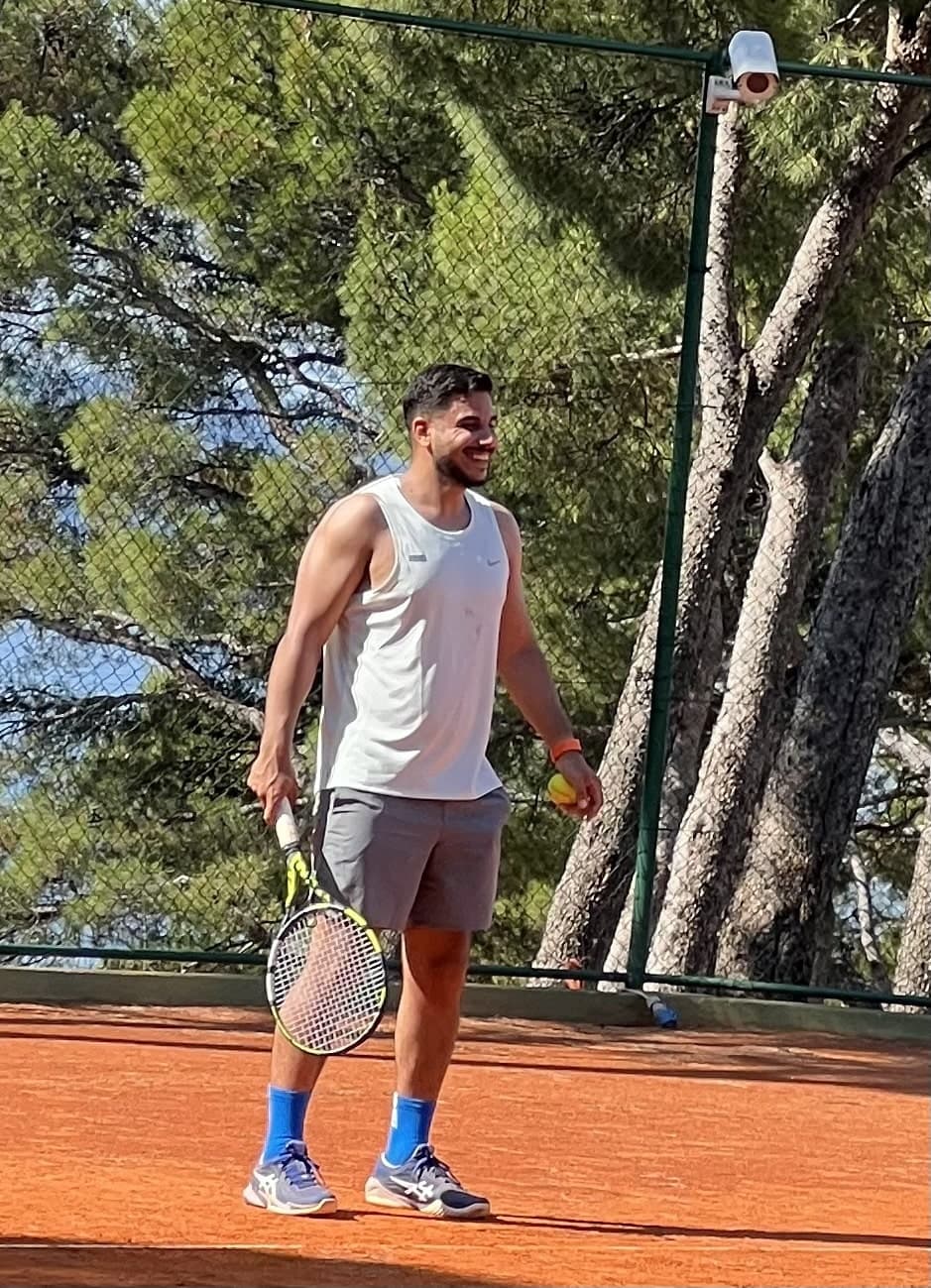 Playing tennis